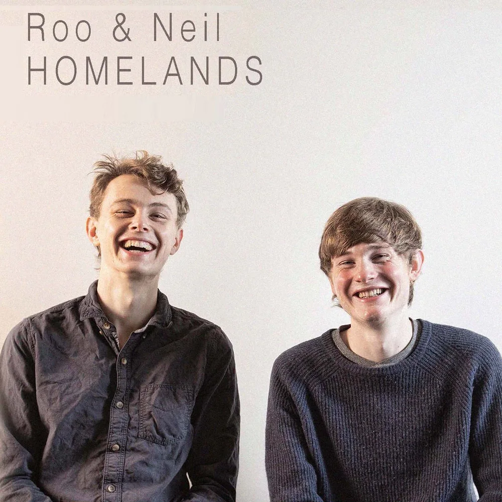 Homelands album cover: Roo and Neil laughing against a pale wall